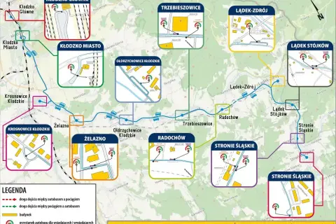 Mapa pokazuje trasy autobusów i pociągów, jak sprawdzić czy pociąg jest opóźniony, zaznaczając przystanki i budynki.