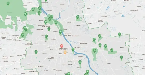 Mapa zielonych terenów i ścieżek rowerowych w okolicach Warszawy. Widać zaznaczone obszary zielone i punkty z ikonami rowerów.